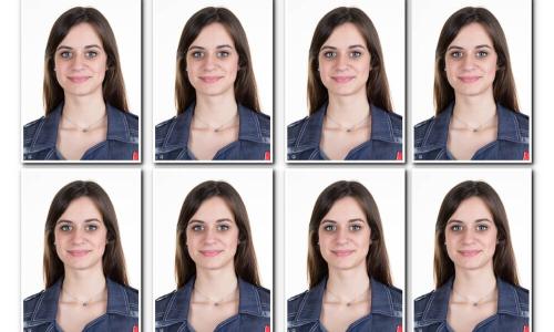 young woman passport photo long dark hair