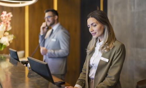 Hotel manager at reception