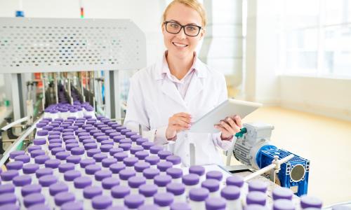 Food technologist working on the line